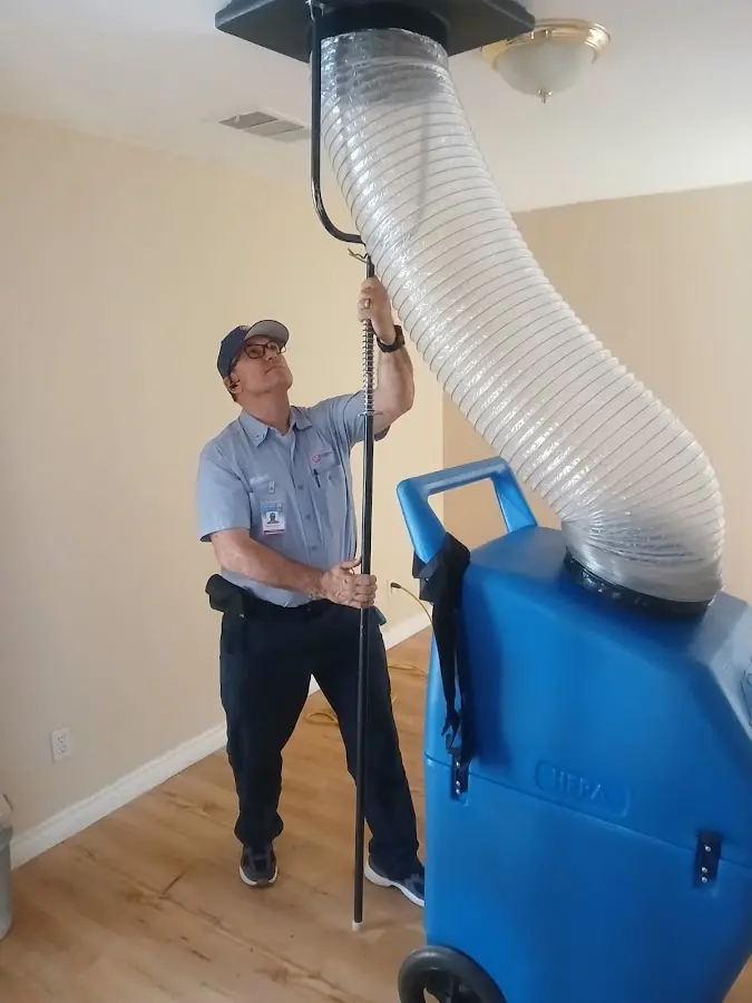 HVAC Installation technician using HEPA equipment in Rittman